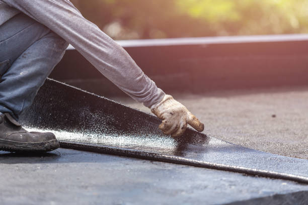 Professional Waterproofing technician working in Saint Johns, OH